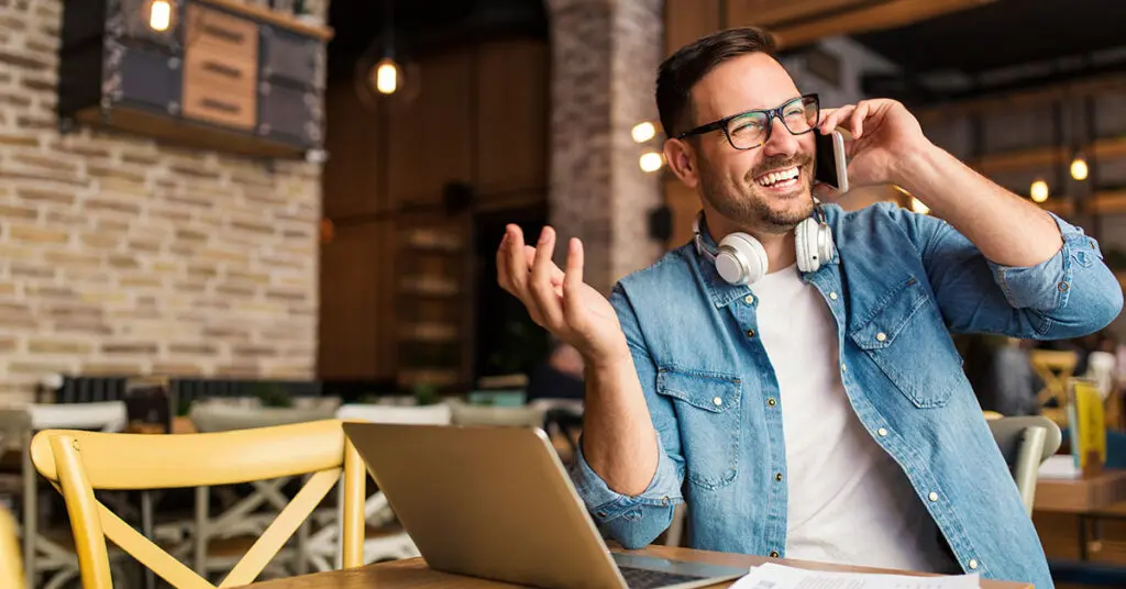 Freelancer working professionally on a laptop in a clean, organized workspace, representing reliability and focus